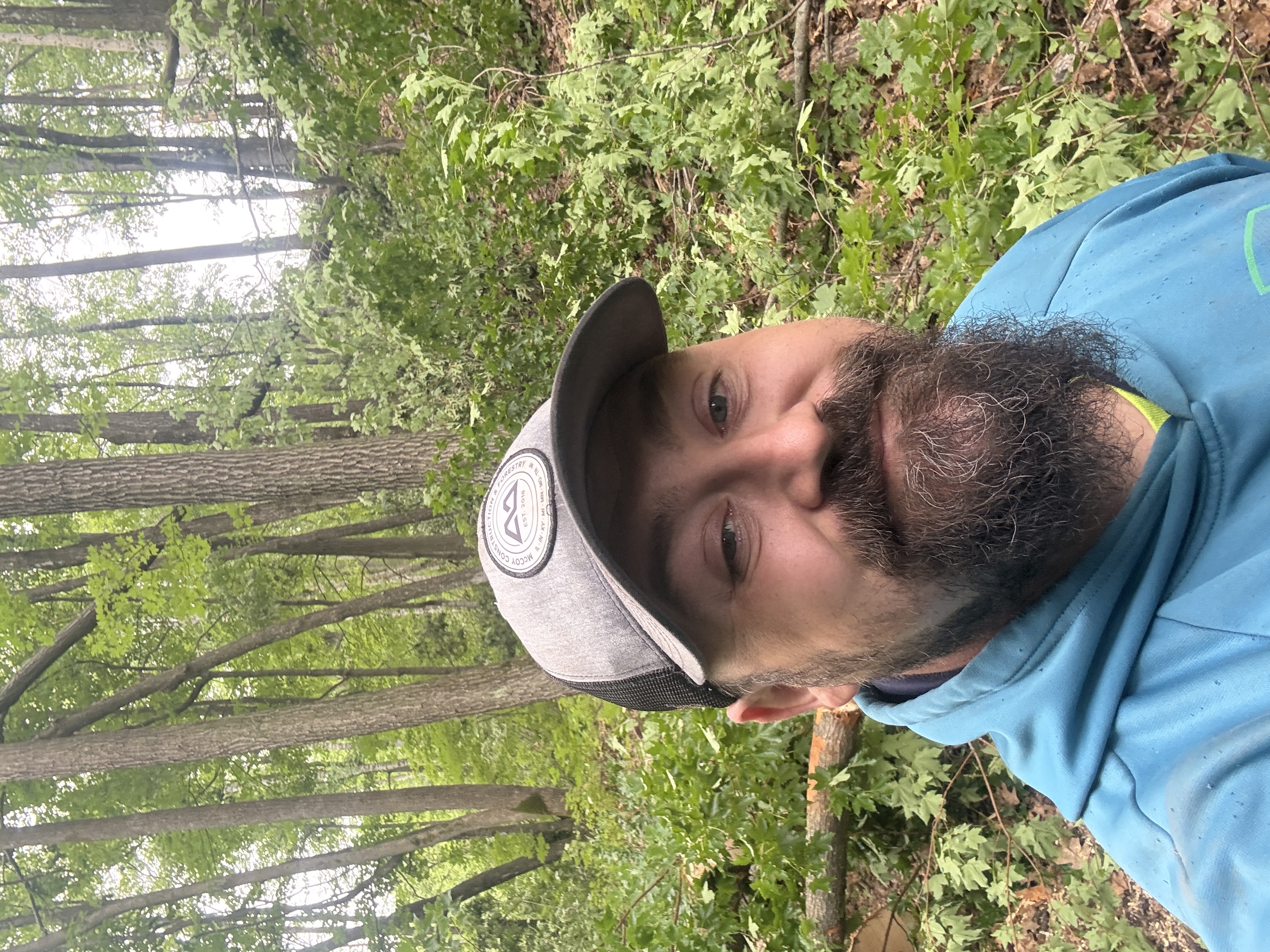 Trinton Dailey in the woods